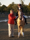 Lily and Heart of Gold receive congratulations from Region 3 Director, Sandi Bishop.