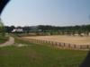 View of warmup ring with show barns in background