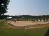 View of warmup ring with show barns in background